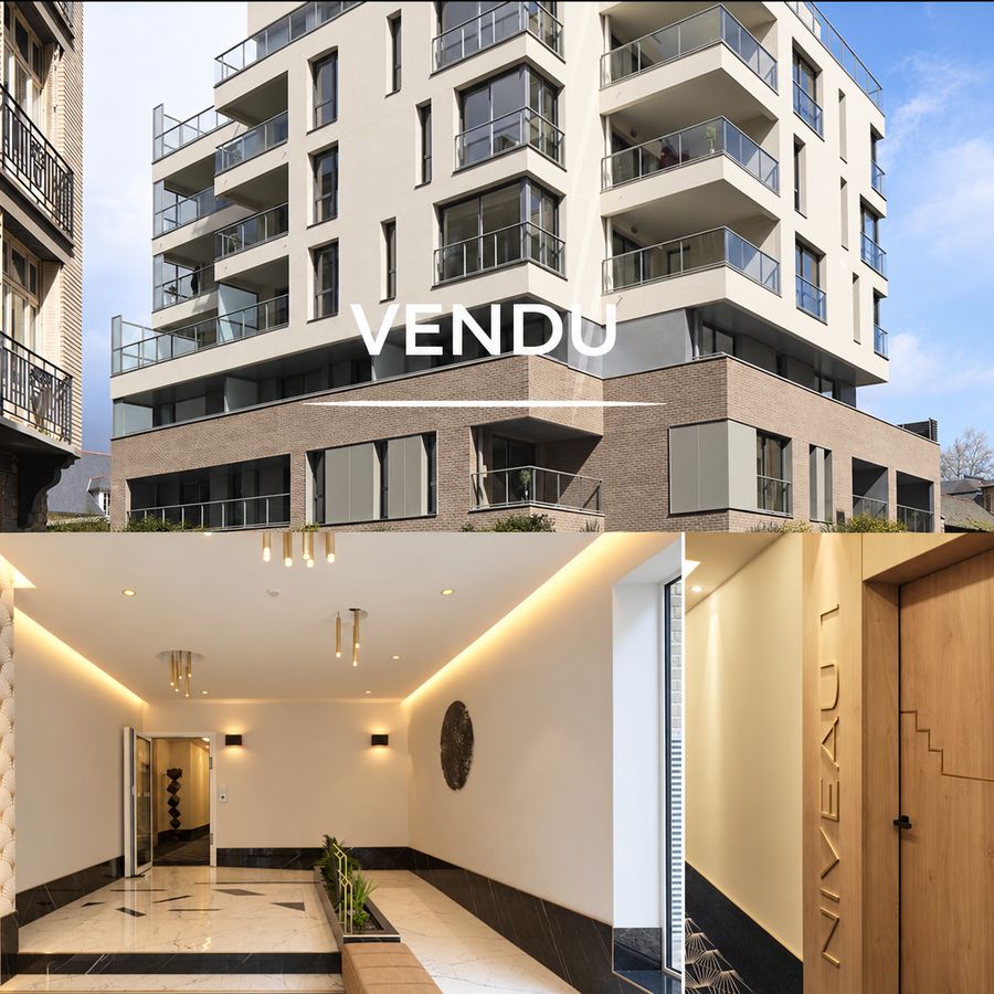 Appartement de 74 m² vendu dans une résidence de standing au centre de Rennes : façade, hall d'entrée et palier